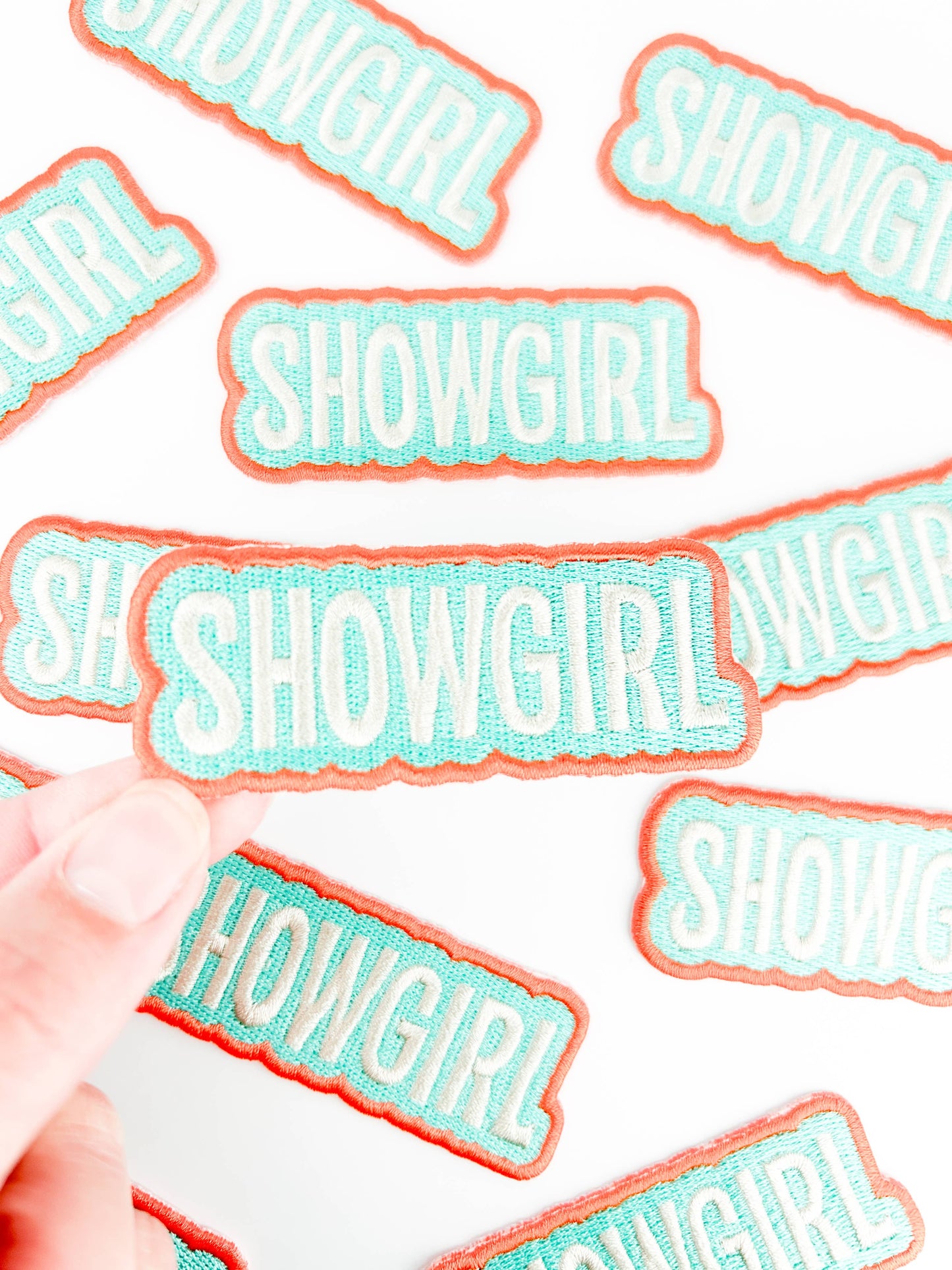 Showgirl Brodert Strykemerke