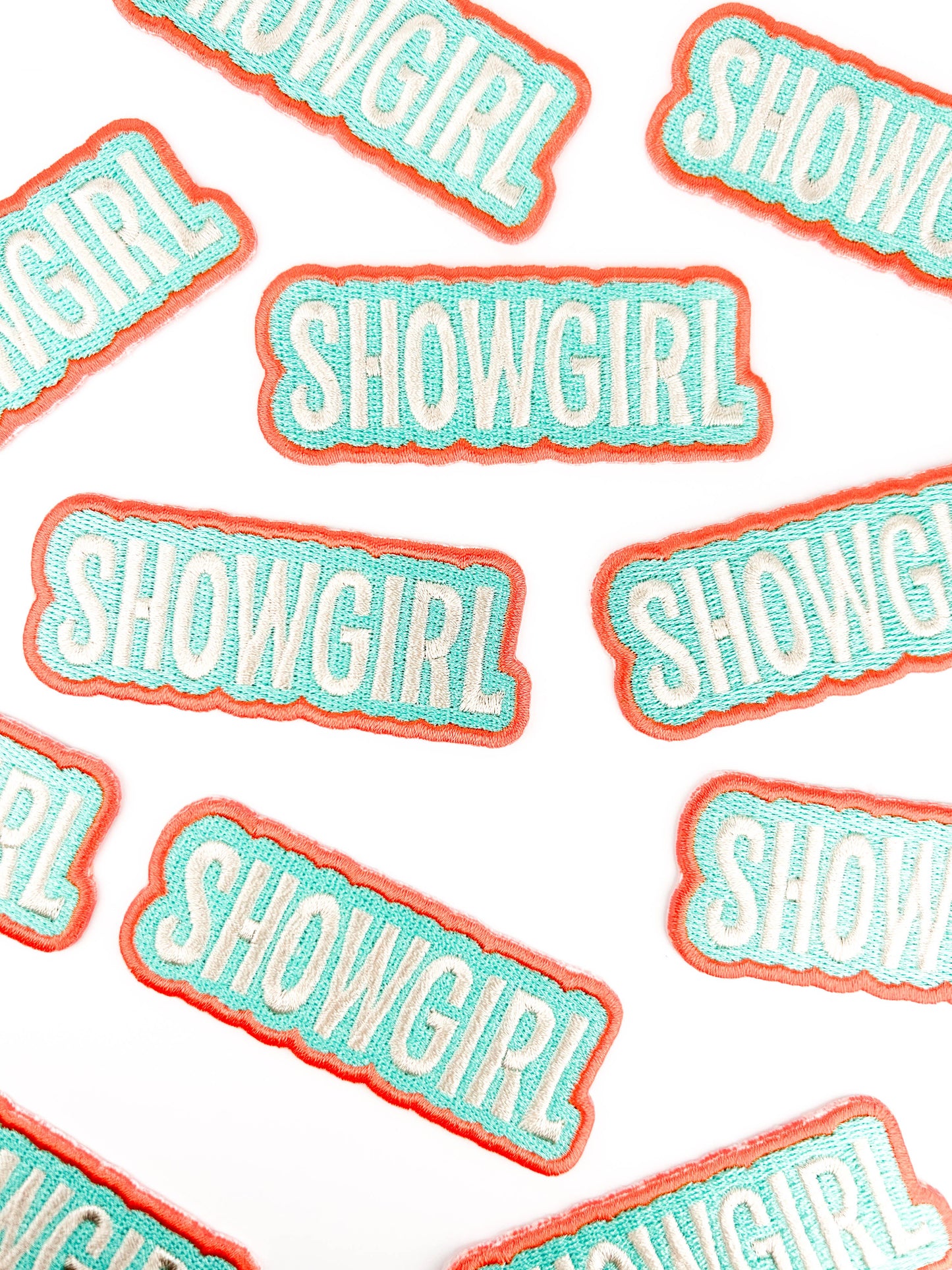 Showgirl Brodert Strykemerke