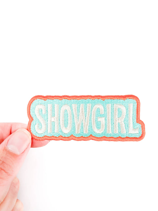 Showgirl Brodert Strykemerke