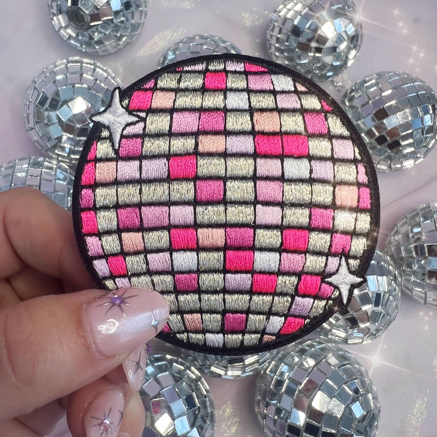 Rosa Disco Ball Strykemerke